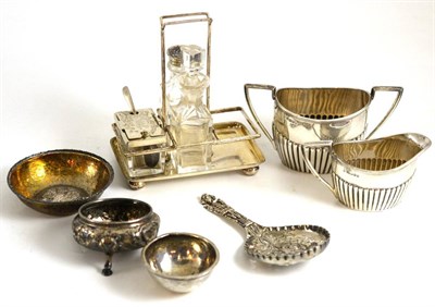 Lot 115 - A group of silver and white metal including a milk jug and sugar bowl, Sheffield 1885 Walker...