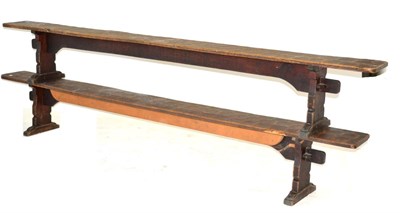 Lot 638 - A Pair of Robert  "Mouseman " Thompson Oak 10ft Benches, on two shaped supports, joined by a...