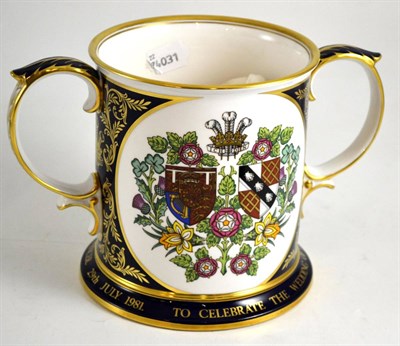 Lot 133 - A Spode Royal Wedding loving cup, 16/250, Prince Charles and Lady Di, boxed, with certificate