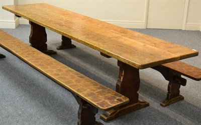 Lot 639 - A Robert  "Mouseman " Thompson Oak 10ft Refectory Table, on two shaped supports, joined by a...