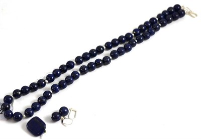 Lot 161 - A lapis lazuli necklace, brooch and pair of earrings