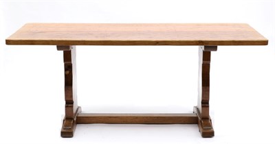 Lot 643 - A Robert  "Mouseman " Thompson Oak 6ft Dowelled Top Rectangular Refectory Table, on two shaped...