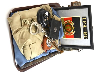 Lot 228 - Police related items including cuffs, whistle, truncheon etc