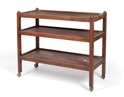 Lot 649 - A 1960's Robert  "Mouseman " Thompson Oak Tea Trolley, each of the three tiers with raised...