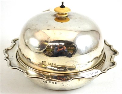 Lot 244 - A silver muffin dish and cover