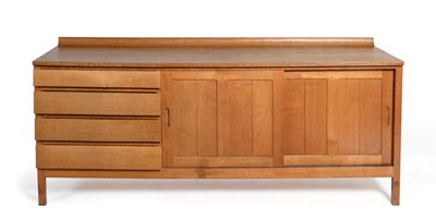 Lot 651 - An Acorn Industries Oak 6ft Sideboard, with raised upstand, the rectangular top above four...