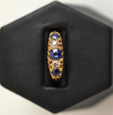 Lot 266 - Five stone sapphire and diamond ring in 18ct gold mount