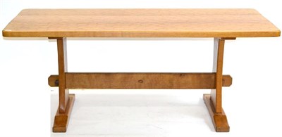 Lot 652 - An Acorn Industries Oak 6ft Refectory Table, on two shaped supports, joined by a stretcher,...