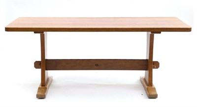 Lot 654 - An Acorn Industries Oak 6ft Refectory Table, on two shaped supports, joined by a stretcher,...