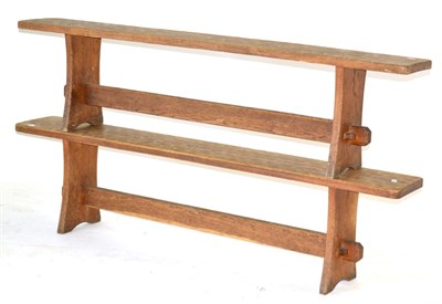 Lot 655 - A Pair of Acorn Industries Oak 6ft Benches, on two shaped supports, joined by a rail, with recessed