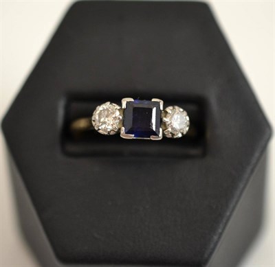 Lot 310 - A sapphire and diamond three stone ring, stamped '18CT' and 'PLAT'