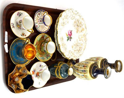 Lot 318 - A collection of Continental porcelain including two Meissen plates, six coffee cans and...