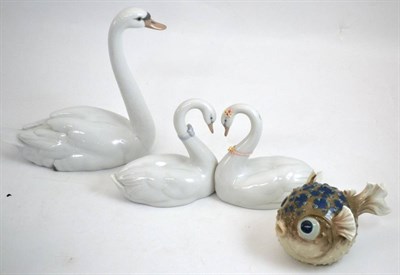 Lot 321 - Three Lladro groups, ";Endless Love";, ";Graceful Swan"; and ";Puffer Fish";, two boxed