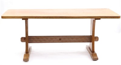 Lot 658 - An Acorn Industries Oak 6ft Refectory Table, on two shaped supports, joined by a stretcher,...