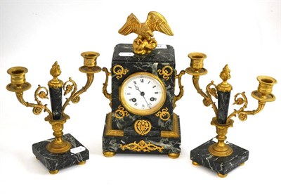 Lot 347 - A Regency style gilt metal mounted marble clock garniture