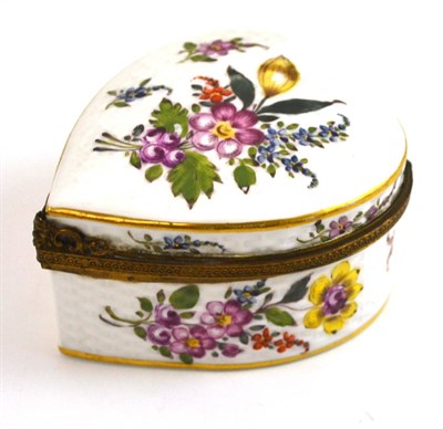 Lot 351 - A Meissen porcelain heart shaped box painted with flowers