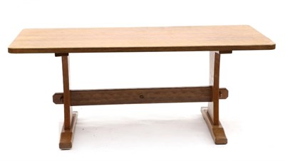 Lot 660 - An Acorn Industries Oak 6ft Refectory Table, on two shaped supports, joined by a stretcher,...