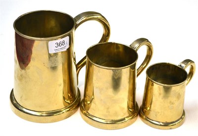 Lot 368 - Three 19th century graduated brass tankards