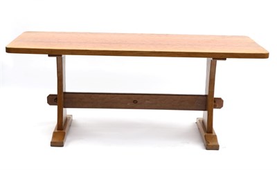 Lot 662 - An Acorn Industries Oak 6ft Refectory Table, on two shaped supports, joined by a stretcher,...