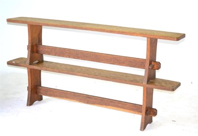 Lot 663 - A Pair of Acorn Industries Oak 6ft Benches, on two shaped supports, joined by a rail, with recessed