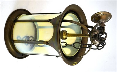 Lot 383 - An Arts & Crafts patinated brass hall lantern, with a vaseline cylinder glass shade, 35cm