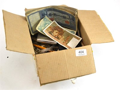 Lot 404 - A quantity of wartime currency, assorted silver including a cigarette case, scrap silver etc