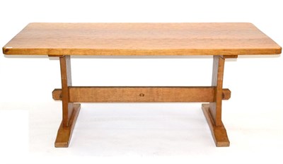 Lot 670 - An Acorn Industries Oak 6ft Refectory Table, on two shaped supports, joined by a stretcher,...