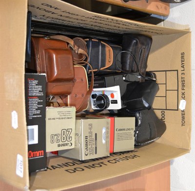 Lot 1017 - Canon AEI, three lenses, one damaged and assorted related items