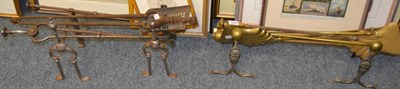 Lot 1036 - A set of brass fire irons, steel irons and irons etc