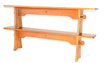 Lot 673 - A Pair of Acorn Industries Oak 6ft Benches, on two shaped supports, joined by a rail, with recessed