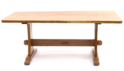 Lot 674 - An Acorn Industries Oak 6ft Refectory Table, on two shaped supports, joined by a stretcher,...