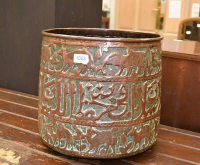 Lot 1053 - A 19th century Indian chased copper jardiniere