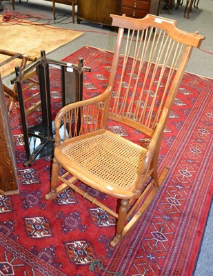 Lot 1075 - An aesthetic corner shelf with mirrored back and a rocking chair (2)