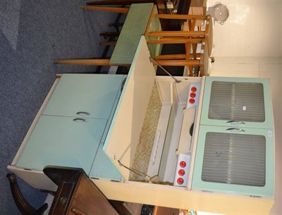 Lot 1080 - A 1950's kitchenette with original fittings and a Formica covered table and two stools