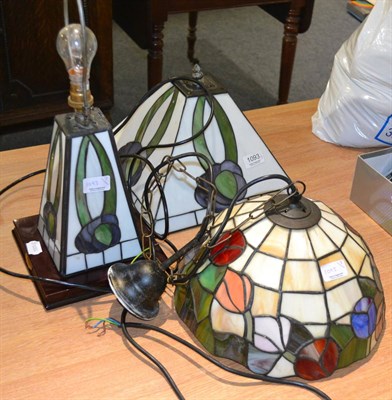 Lot 1093 - Two leaded glass shades and a similar modern leaded glass table lamp (3)