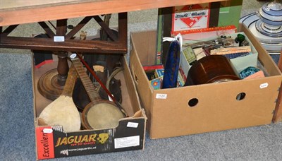 Lot 1124 - An Irish violin carved with a stylised lions head, a glass rolling pin, a green glass eye bath,...