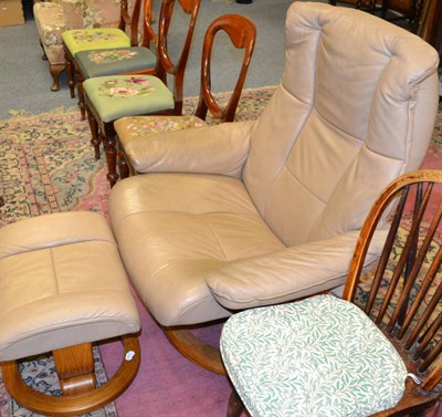 Lot 1129 - Light brown leather Stressless chair and stool