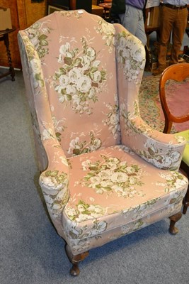 Lot 1130 - Wingback armchair and two piece conservatory suite