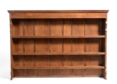 Lot 683 - An Albert  "Eagleman " Jeffray Oak Delft Rack, the panelled back with three fixed shelves, with...