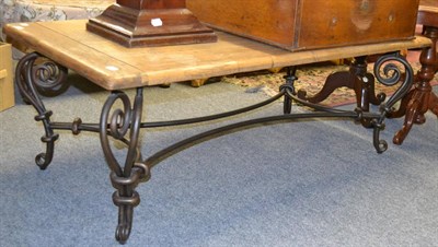 Lot 1131 - A wrought iron and oak coffee table