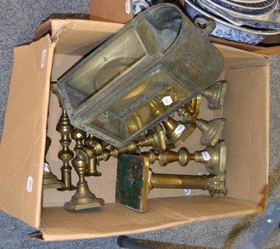 Lot 1140 - A set of four Victorian brass candlesticks (two pairs), four odd ones, a brass lamp and a lamp base