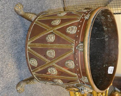 Lot 1145 - A Victorian copper and brass coal bucket, decorated with applied lions head motifs, two lions...