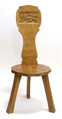 Lot 687 - A Thomas  "Gnomeman " Whittaker Oak Spinning Chair, the adzed circular seat below a shaped back...