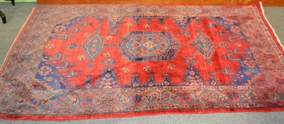 Lot 1235 - Viss rug, North West Persia, the crimson field centred by a sky blue medallion framed by...