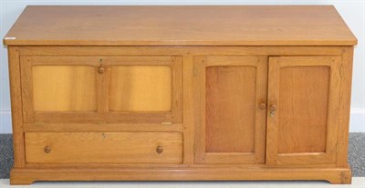 Lot 695 - A Michael  "Seahorse " Riley Panelled Oak Television Cabinet, the rectangular top over a pair...