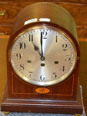 Lot 1248 - A mahogany cased bracket clock in the Georgian style, with circular silvered dial with Arabic...