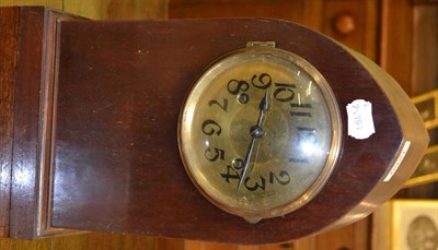 Lot 1250 - A mahogany lancet cased mantel clock, with the circular brass dial, quite plain, with Arabic...