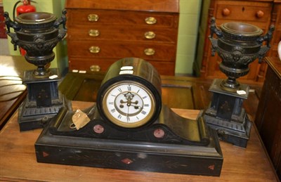 Lot 1251 - A black slate clock garniture