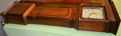 Lot 1253 - An early Victorian oak and mahogany longcase clock with square hood, moulded cornice above a square