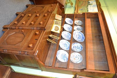 Lot 1265 - A 19th century breakfront oak dresser and rack